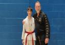 Dylan Faulkner won a gold Taekwondo World Championship medal in the boy's red belt sparring class.