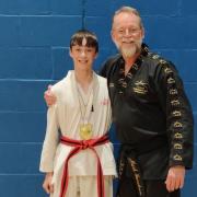 Dylan Faulkner won a gold Taekwondo World Championship medal in the boy's red belt sparring class.