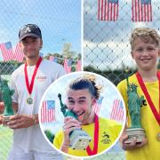 Winning tennis players were awarded miniature Statues of Liberty and medals.