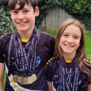 Jacob and Lyra Schultz won 26 medals between them at Luton's Autumn Short Course Meet.