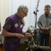 Tracy Grant demonstrating woodturning at a recent meeting.