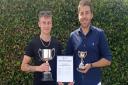 James Burt and Reece Laffar were on hand to receive the East League Division Three North West title for Ely City's men's first team after a successful 2021-22 season.