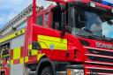 Firefighters were called to the blaze at a building on Fridaybridge Road, Elm.