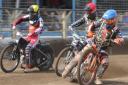 Mildenhall Fen Tigers will face local rivals Kent Royals four times in just the first month of the season. Pictured: Josh Warren (red) racing for the Tigers.