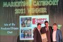 Isle of Ely director Oliver Boutwood and Austen Dack collect the marketing award at the National Potato Awards 2021.