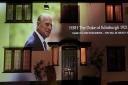 Photographic memories of the late Prince Philip are being projected onto a home in Barton Road, Ely until Sunday, April 25.