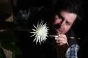 Glasshouse supervisor Alex Summers rare Amazonian cactus called the Moonflower at Cambridge University's Botanic Garden as it blossoms for what botanists believe is the first time in the UK. Experts kept a night watch throughout the week so that they did