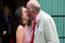 Fenland Deputy Mayor of March marries younger bride in hush hush register marriage. Pictured Deputy Mayor Kit Owen and new wife Aiza Bonus-Owen kiss outside March Library after the wedding.Register Office and Library, MarchFriday 11 January 2019. Picture 