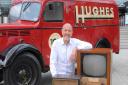Robert Hughes (pictured) and the special van recreated to celebrate Hughes Electricals’ 100 years in business.