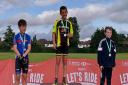 Ely junior rider Harvey Woodroffe on top of the podium after winning a grasstrack event in Hertford.