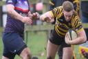 Matt McCarthy gets tackled for Ely Tigers at Thurston. Picture: STEVE WELLS