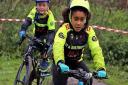 Ely & District Cycling Club juniors Lucas Bowman and Eleanor Stewart racing to victory at Muddy Monsters. Picture: DAVEY JONES.