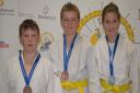 Success for schools at Eastern Area Schools Judo Championship 2019. The competition was held at Littleport Leisure. Pictured are Yonas Aldous from The Cambridge Academy of Science and Technology, Freddie Marshall from King's Ely and Daisy Simpson from Wit