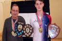 Ely Archers - 18 Medals at County Shoot: Malcolm Basing, Gents Barebow County Champ (left) and Harry Tapp (Junior Gents Recurve County Champ. Picture: DANIEL COE.