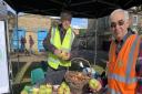 David Coventry (back) and Mike Axford from the Ely Rotary Club which held its annual longest apple peel competition.