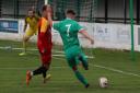 Ollie Ward (in green) is unlikely to feature again for Soham Town Rangers this season after joining the Royal Marines.