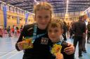 Lily Robinson and Alex Ellington both won gold at the Brazilian Jiu-Jitsu Junior National Championships in Wolverhampton.