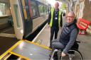 Downham Market - mobile assistance team member John Francis assists passenger Gio Strawbridge