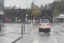 Sainsbury's car park in Ely is flooded this morning after heavy rain from Storm Babet.
