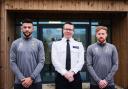 Chief Superintendent Jon Hutchinson with players James Brophy and Macauley Bonne.