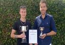 James Burt and Reece Laffar were on hand to receive the East League Division Three North West title for Ely City's men's first team after a successful 2021-22 season.