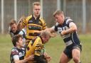 Paul Dewey under pressure in Ely Tigers' league defeat at Cantabrigian.