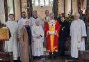 Ely mayor, Cllr Richard Morgan, welcomes new priest to St Peter's Church.