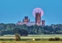 The 'Strawberry Moon' captured behind Ely Cathedral on Saturday evening.