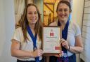 Jess and Sarah from Oliver Cromwell's House with the 'Hidden Gem' award.