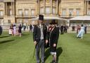 Cllr Richard Morgan (right) and his wife Jane became mayor and mayoress of Ely at King Charles III’s first Garden Party at Buckingham Palace