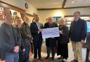The team handed over a cheque to the Addenbrook's charity.