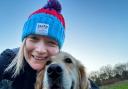 Sarah Borland and her dog, Trudy, after a marathon training session.