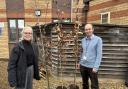 Elizabeth Henerson, Head Teacher at St Andrew’s Primary School in Soham is pictured collecting her tree from Richard Kay, Strategic Planning Manager at the council.