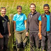 Martin Lester (far left), who is retiring after 27 years at Wicken Fen, has seen the site more than double in size during his career. Pictured is Martin with the ranger team.