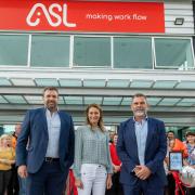 SE Cambs MP Lucy Frazer cut the ribbon at office services supplier ASL's new head office in Ely.
