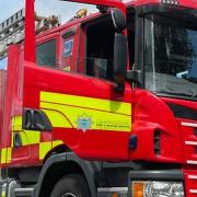 Firefighters were called to the blaze at a building on Fridaybridge Road, Elm.