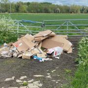 The fly-tip made up of cardboard boxes and packaging discovered on Fen Road in Milton