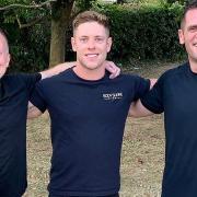 Tim Megginson (centre) of Body Shape Fitness will aim to set a new world record in taking part in the highest altitude fitness class on Earth. Tim is pictured with long-serving clients Wes Hooper and Ryan Creak.