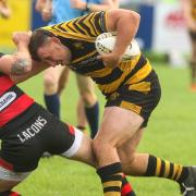 Ryan Edgeworth attacks for Ely Tigers
