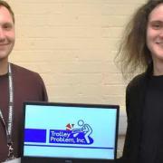17-year-old Iain Walker (R) has created a new computer game with his BAFTA nominated lecturer Sam Read (L).
