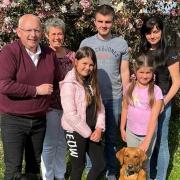 Paul Beastall and wife Tracy Hutchison have welcomed a Ukrainian family to their home in Cottenham as part of the Homes for Ukraine scheme. From back, left: Paul, Tracy, Vitali and mother Viktoria. Front row: Anastasia and Eva, Viktoria's daughters.