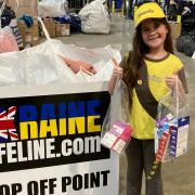 Seven-year-old Amelia took a tour at the headquarters of 'Ukraine Lifeline' in Pymoor where she donated different items.