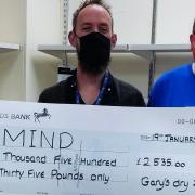 Gary Creak (far right) raised £2,535 for mental health charity Mind's Ely branch by drinking no alcohol throughout 2021.