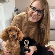 Mara, a cockapoo, has been voted winner of Ely Standard Pet of the Year. She is seen with her owner Taylor at home in Sutton