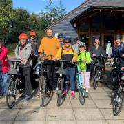 Electric bike ride to highlight Swaffham Prior's green energy scheme marks global climate change conference COP26. The riders are pictured.