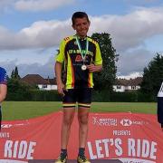 Ely junior rider Harvey Woodroffe on top of the podium after winning a grasstrack event in Hertford.