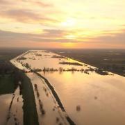 Jason Cox captured drone footage of flooded fields at Sutton Gault just before sunset following recent flooding.
