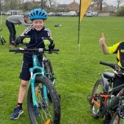Beau Havis, Freddie Henry and Luca Portaluri celebrating for Ely & District Cycling Club.