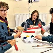 Littleport Scouts making props for The Littleport Players panto. From left: Jacob, Charlie, Gracie, Nathaniel and Jacob.