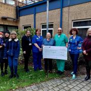 Debbie Hitchings (M) presented a cheque worth £840 to her consultant surgeon Mr Parto Forouhi at Cambridge Breast Cancer Unit on January 11.